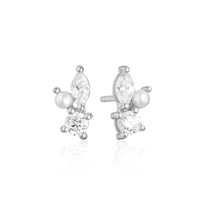 Detail of S925 silver pearl earring with marquise and round zircon stones on white background