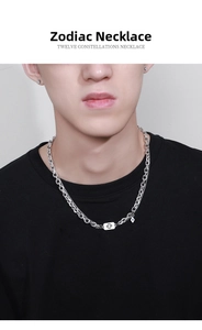 Close-up of men's Cancer constellation necklace with silver rectangular pendant