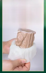 Detailed view of flexible silicone mold with owl candle and easy release feature