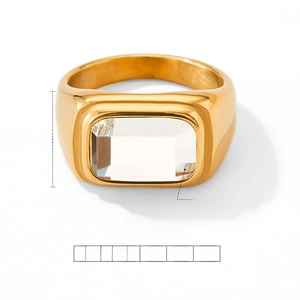 Detail of 11.7mm wide gold signet ring featuring a large rectangular cubic zirconia stone