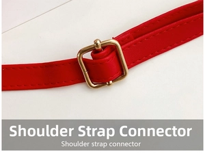 Detail of red faux leather shoulder strap with golden adjustable metal buckle
