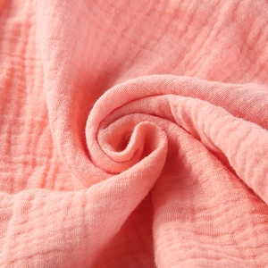 Pink double-layer cotton muslin baby security blanket fabric texture close-up detail