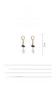 Macro shot showing 4.5cm natural baroque pearl earrings with black agate and 18k gold plating