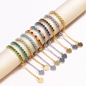 Adjustable zircon bracelets with heart charms in gold and silver finish display