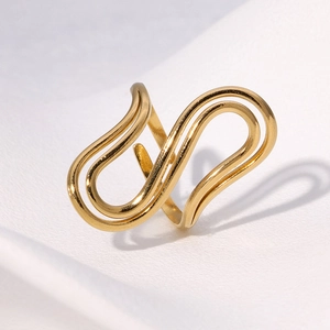 Minimalist gold wave-shaped S-curve stainless steel ring with polished finish