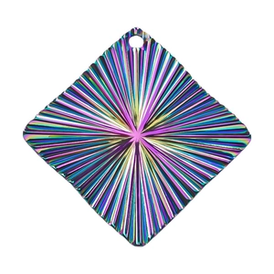 Macro shot of 18k gold plated rainbow rhombus pendant with radial sunburst texture