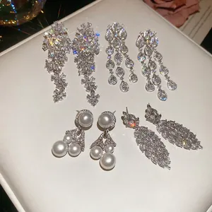 Sparkling zircon hollow flower tassel earrings with silver pins for women fashion