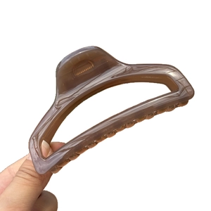 Elegant 10cm amber brown perfume bottle hair claw clip with a transparent finish