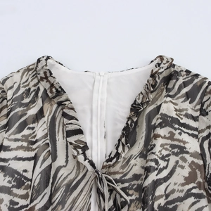 Tiger print V-neck chiffon dress with ruffled neckline and hidden back zipper