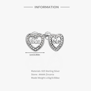Detail of 925 sterling silver heart earrings with Sister engraving and cubic zirconia