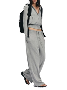 Side view of soft light grey hooded sweatshirt and matching drawstring sweatpants set