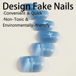 Short square press-on nails with blue starry night design and romantic art silhouettes