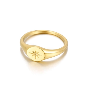Polished gold stainless steel signet ring with engraved eight-pointed star motif