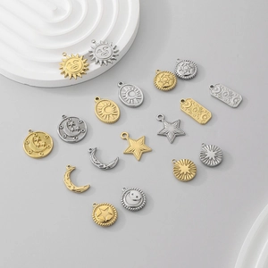 Detailed collection of sun, moon and star charms in gold and silver stainless steel