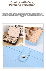 Close-up of portable leather jewelry box with earring plate and ring organizer slots