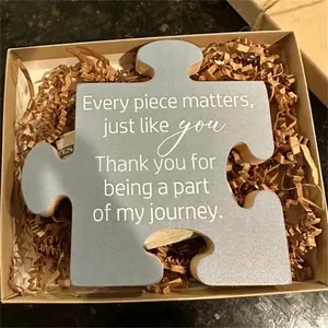 Puzzle-shaped wooden gift plaque with heartfelt message in a premium kraft gift box