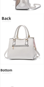 Detailed back view showing the zipper pocket and sturdy bottom of the colorblock handbag