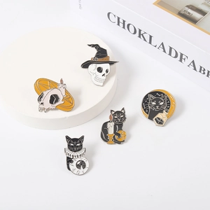 Set of five gothic Halloween enamel pins featuring skeletal cats and mystic moon motifs