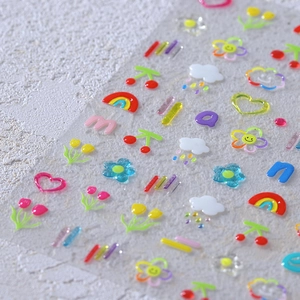 3D embossed nail art stickers with cute rainbow, cherry, and floral patterns