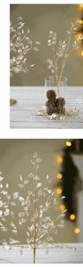 Christmas gold glitter acrylic leaves stems in a glass jar with pine cones