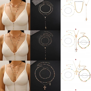 Detail view of layered zinc alloy rosary necklaces with cross pendant and size specifications