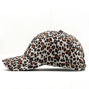 Side view of leopard print baseball cap featuring curved brim and six-panel structure