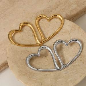 Minimalist exaggerated hollow heart earrings in polished gold and silver stainless steel