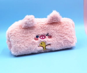 Detail of soft pink plush pencil case featuring cute pig embroidery and 3D ears