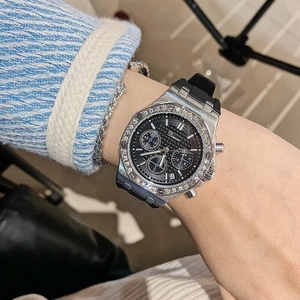 Women's Dimini silver chronograph watch with diamond bezel and black rubber strap
