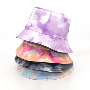 Tie-dye cotton bucket hats in four colors including purple and blue for sun protection