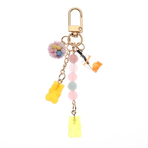 Cute rainbow gummy bear keychain with mini milk tea cup and colorful beads for earbuds