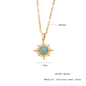 Detail showing 40+5cm chain and 1.8cm gold sun pendant with turquoise stone inlay