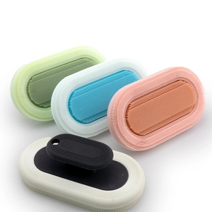 Multipurpose silicone bath brushes in four colors with soft bristles and hand grips
