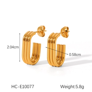 Detail view of 18K gold-plated triple-layered linear U-shaped earrings with measurements