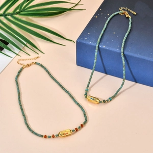 Bohemian turquoise beaded necklace with gold-plated evil eye enamel pendant charm