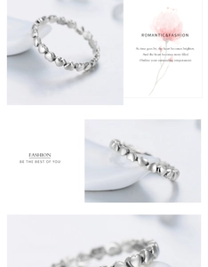 Detailed macro view of S925 silver ring featuring a continuous linked heart design