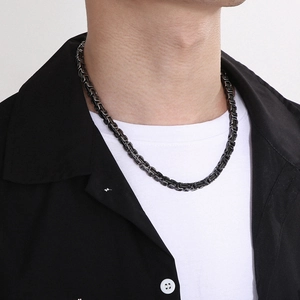 Men's black Byzantine chain necklace in stainless steel shown on a male model