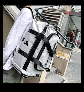 Macro detail of waterproof white Oxford fabric with geometric logo and durable strap