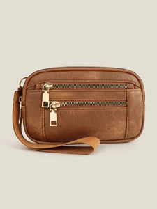 Macro shot of brown pebble-grain PU wallet showing triple gold zipper compartments and wristlet