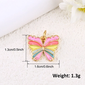 Macro shot of colorful butterfly pendant with size and weight dimensions in centimeters