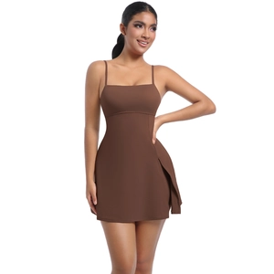 Detail of high-stretch brown sports dress with thin straps and side slit for tennis and yoga