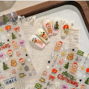 Close-up of TS-4197 Christmas bear nail stickers with tree and snowflake patterns