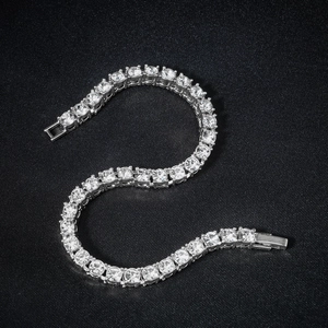 Detailed close-up of 4mm silver tennis chain with brilliant round-cut cubic zirconia stones