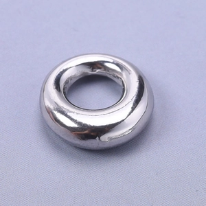 Detailed close-up of a smooth silver-colored oval 304 stainless steel ring for DIY jewelry