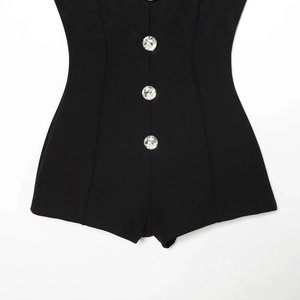 Chic black women romper featuring three large sparkling rhinestone jewelry buttons