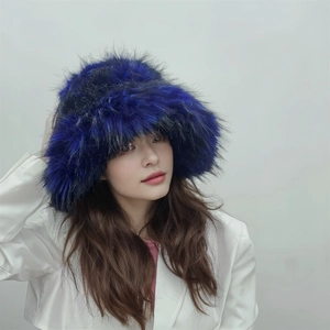 Detailed view of the thick blue and black faux fur texture on the stylish punk winter hat