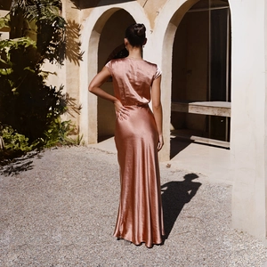 Elegant rose gold satin maxi dress with a flattering slim fit fishtail back view design