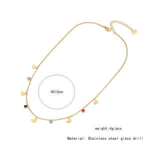 Detail showing 40+5cm length and 4g weight specs for this gold stainless steel heart necklace