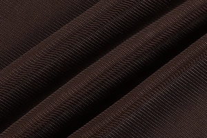Detail shot of the breathable dark brown pleated mesh fabric with elegant wavy texture
