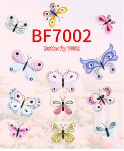 Detailed close-up of 12 colorful PVC butterfly wall stickers with various patterns and wings